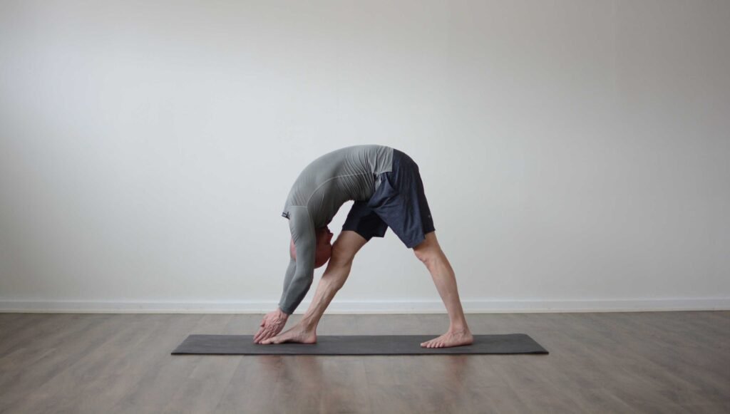 standing seperate leg head to knee pose